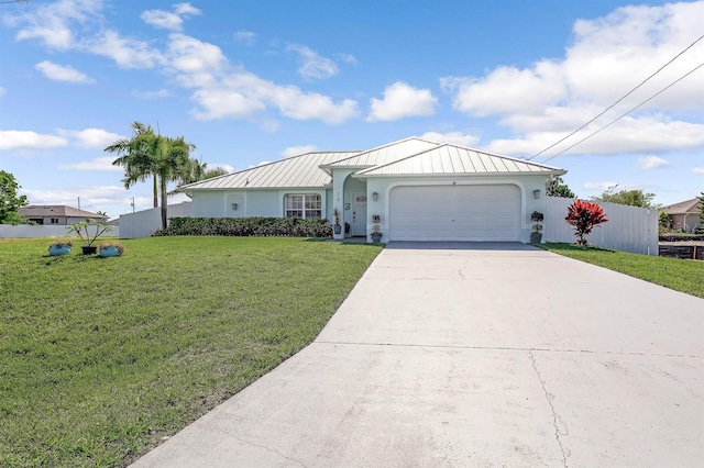 28 SW 21st Ave, Cape Coral, FL 33991 - ranch-style home featuring a standing seam roof, stucco siding, a garage, and driveway