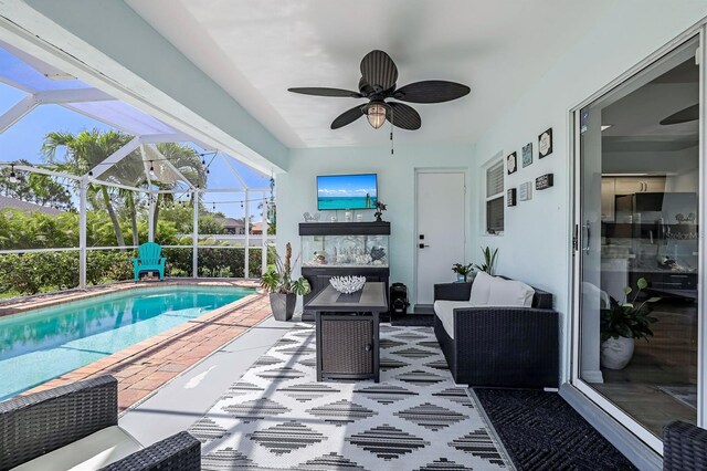 28 SW 21st Ave, Cape Coral, FL 33991 - view of patio / terrace featuring an outdoor living space, an outdoor pool, ceiling fan, and glass enclosure