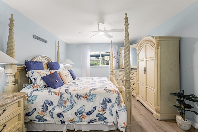28 SW 21st Ave, Cape Coral, FL 33991 - bedroom with light wood finished floors and ceiling fan