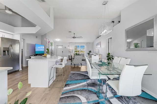 28 SW 21st Ave, Cape Coral, FL 33991 - dining room featuring light wood finished floors and ceiling fan