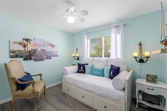 28 SW 21st Ave, Cape Coral, FL 33991 - sitting room featuring wood finished floors, ceiling fan, and baseboards