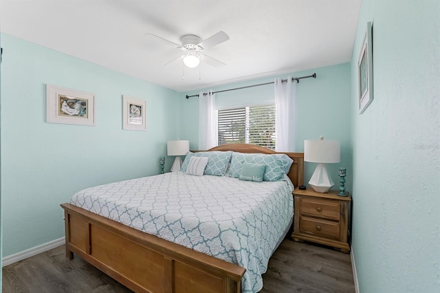 28 SW 21st Ave, Cape Coral, FL 33991 - bedroom featuring dark wood-type flooring, baseboards, and ceiling fan