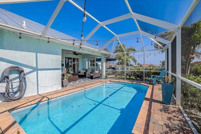28 SW 21st Ave, Cape Coral, FL 33991 - swimming pool with outdoor lounge area, ceiling fan, a patio area, and a lanai