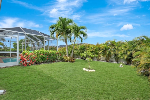 28 SW 21st Ave, Cape Coral, FL 33991 - view of yard featuring an outdoor pool and a lanai