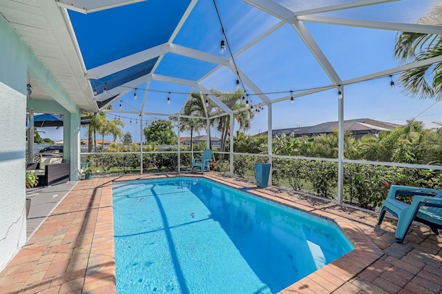 28 SW 21st Ave, Cape Coral, FL 33991 - outdoor pool featuring a patio and a lanai