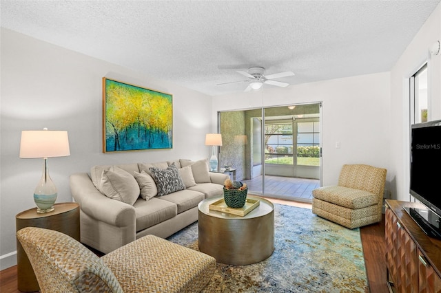 2460 Northside Dr Unit 802, Clearwater, FL 33761 - living room featuring a textured ceiling, wood finished floors, and ceiling fan