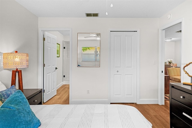 2460 Northside Dr Unit 802, Clearwater, FL 33761 - bedroom with light wood-type flooring and a closet
