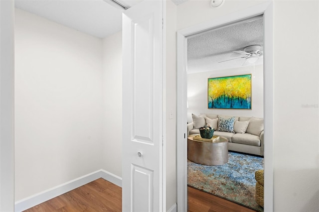 2460 Northside Dr Unit 802, Clearwater, FL 33761 - hall with wood finished floors and a textured ceiling