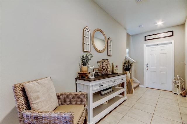 9334 Lemon Drop Loop, Sun City Center, FL 33573 - entrance foyer featuring light tile patterned flooring and stairway
