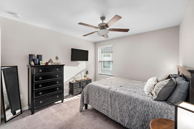 9334 Lemon Drop Loop, Sun City Center, FL 33573 - bedroom featuring light colored carpet, baseboards, and ceiling fan