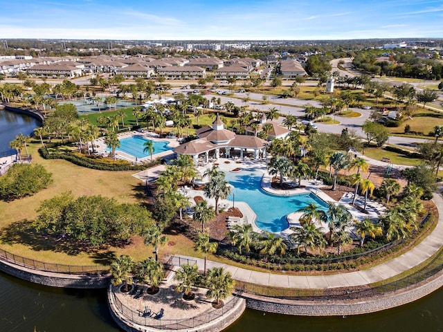 9334 Lemon Drop Loop, Sun City Center, FL 33573 - aerial view of a pool area and a large body of water