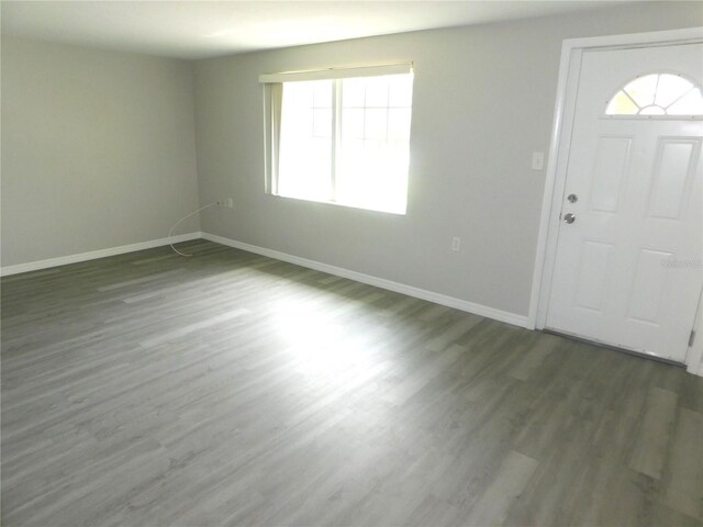 4417 Kohler St, New Port Richey, FL 34652 - entrance foyer featuring baseboards and wood finished floors