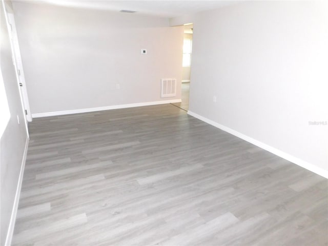 4417 Kohler St, New Port Richey, FL 34652 - empty room featuring wood finished floors and baseboards