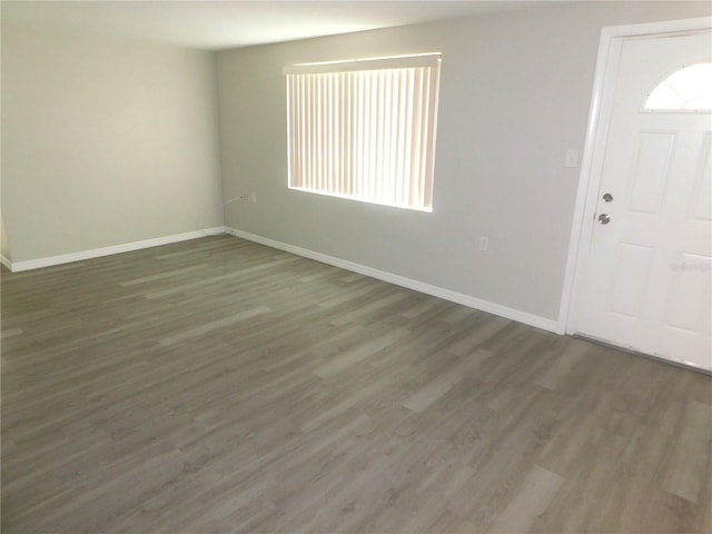 4417 Kohler St, New Port Richey, FL 34652 - foyer entrance with baseboards and wood finished floors