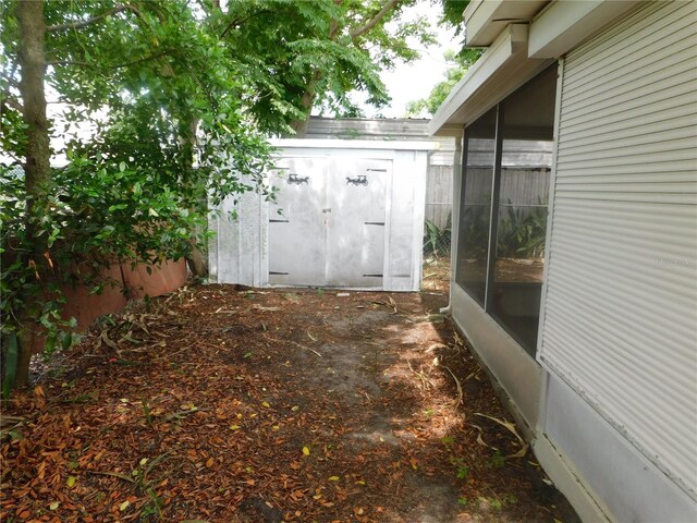 4417 Kohler St, New Port Richey, FL 34652 - view of yard with a sunroom