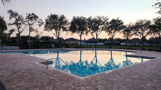221 Fairmont Dr, Spring Hill, FL 34609 - community pool featuring a patio