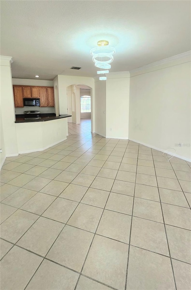 221 Fairmont Dr, Spring Hill, FL 34609 - unfurnished living room with arched walkways, light tile patterned flooring, crown molding, and a chandelier