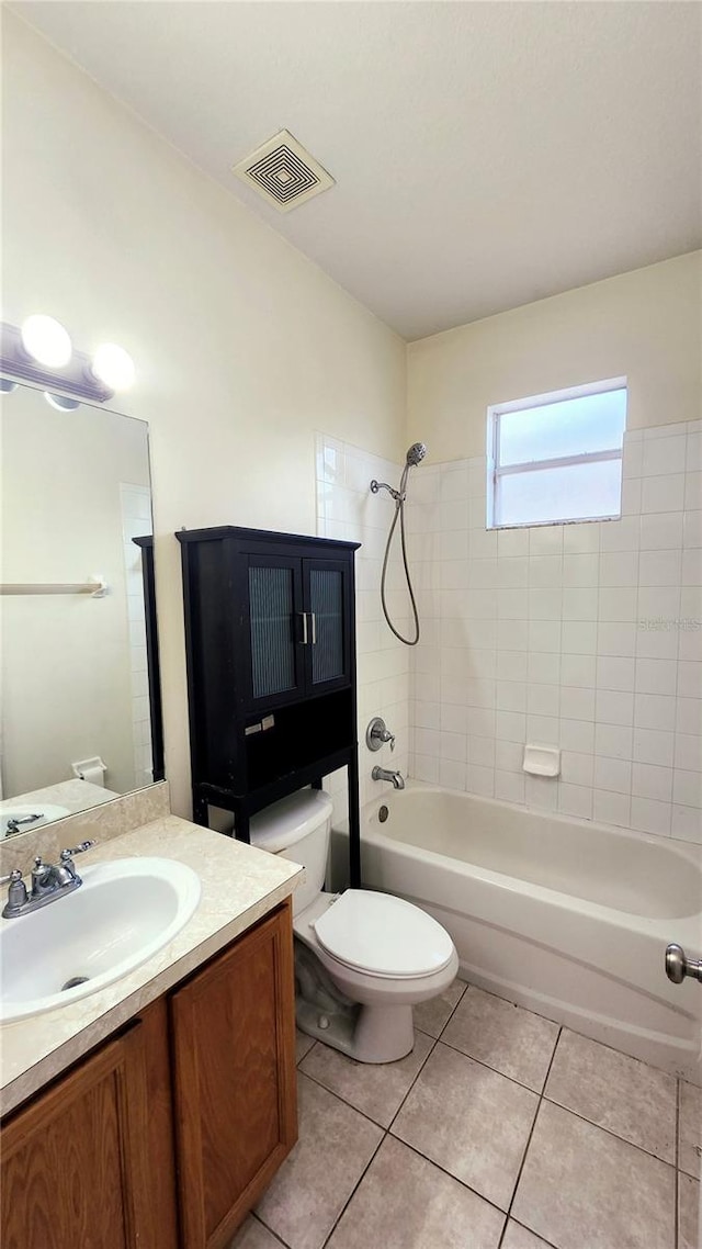 221 Fairmont Dr, Spring Hill, FL 34609 - bathroom featuring vanity, tub / shower combination, and tile patterned floors