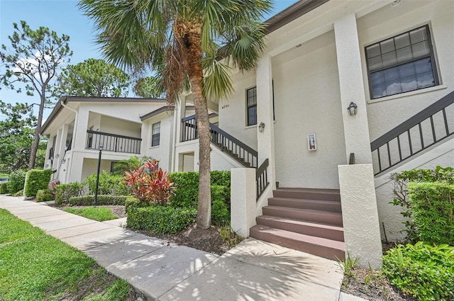 4735 Winslow Beacon Unit 14, Sarasota, FL 34235 - property entrance featuring stucco siding