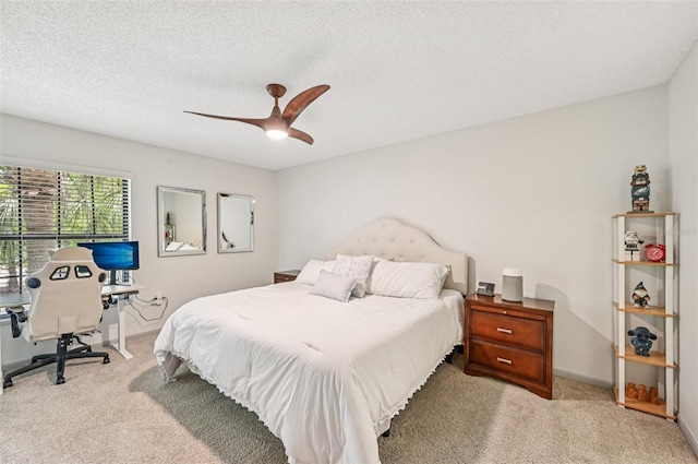 4735 Winslow Beacon Unit 14, Sarasota, FL 34235 - carpeted bedroom with a desk, ceiling fan, and a textured ceiling