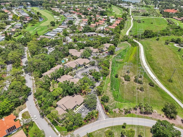 4735 Winslow Beacon Unit 14, Sarasota, FL 34235 - aerial overview of property's location with nearby suburban area and a golf course
