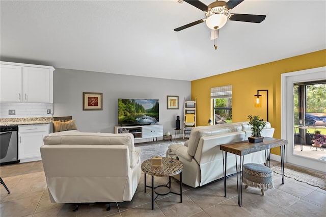 12004 Legacy Bright St, Riverview, FL 33578 - living room featuring healthy amount of natural light, ceiling fan, light tile patterned flooring, and vaulted ceiling