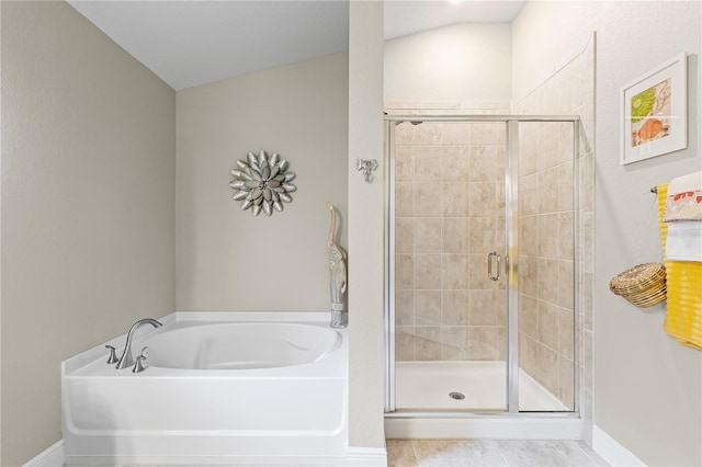 12004 Legacy Bright St, Riverview, FL 33578 - full bath featuring a bath, a stall shower, and tile patterned floors