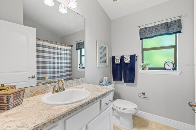 12004 Legacy Bright St, Riverview, FL 33578 - bathroom featuring vaulted ceiling, vanity, tile patterned floors, and curtained shower
