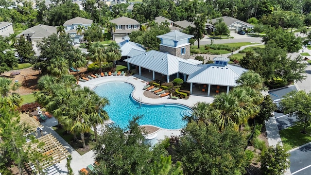 12004 Legacy Bright St, Riverview, FL 33578 - aerial view of residential area featuring a pool area and a tree filled landscape