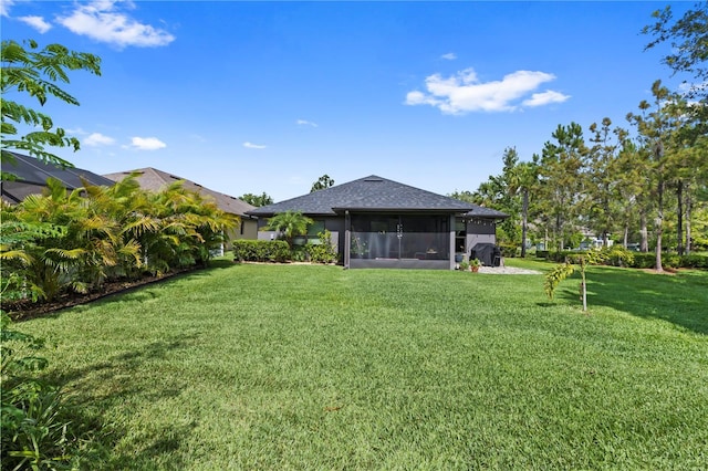 12004 Legacy Bright St, Riverview, FL 33578 - view of grassy yard featuring a sunroom