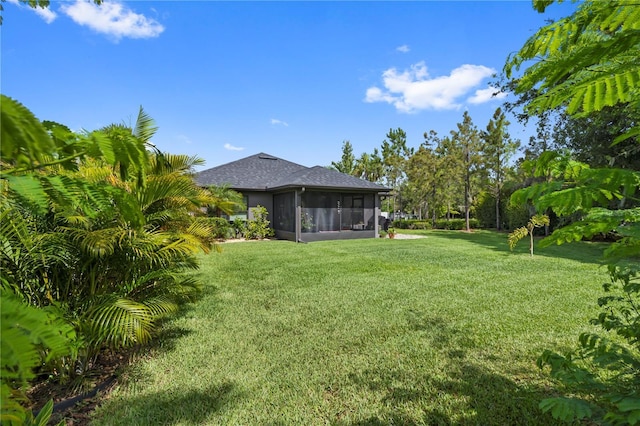 12004 Legacy Bright St, Riverview, FL 33578 - view of grassy yard featuring a sunroom