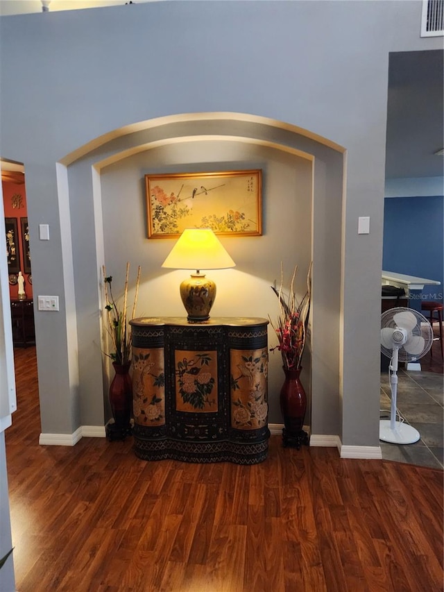 373 Intrepid Way, Indialantic, FL 32903 - detailed view of wood finished floors, baseboards, and arched walkways