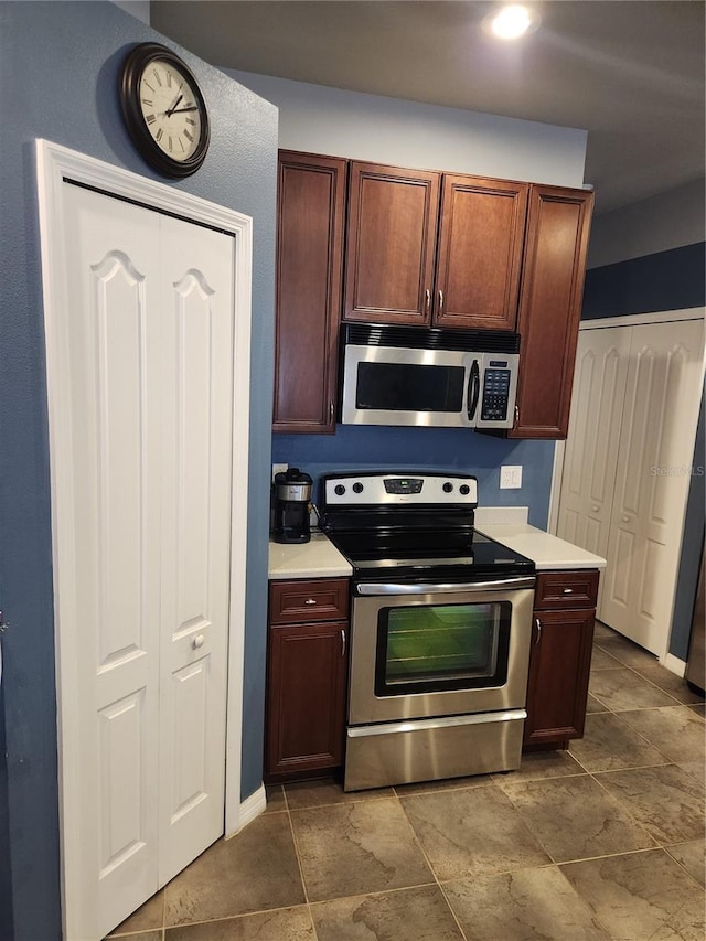 373 Intrepid Way, Indialantic, FL 32903 - kitchen featuring stainless steel appliances and light countertops