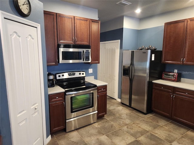 373 Intrepid Way, Indialantic, FL 32903 - kitchen featuring appliances with stainless steel finishes, light countertops, and recessed lighting