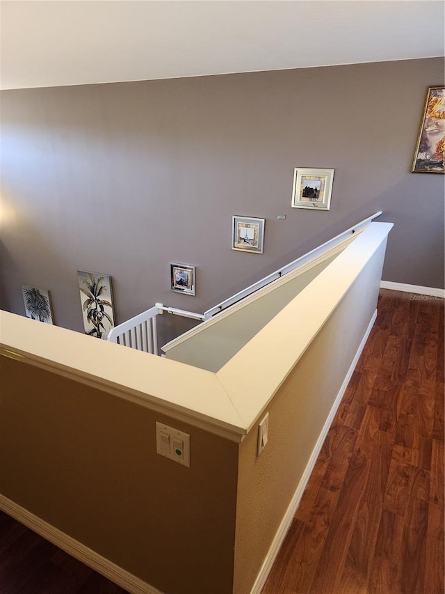 373 Intrepid Way, Indialantic, FL 32903 - staircase featuring wood finished floors and baseboards