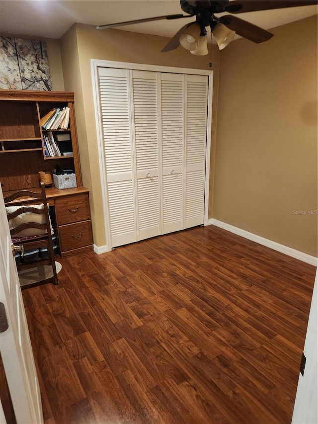 373 Intrepid Way, Indialantic, FL 32903 - unfurnished office with a ceiling fan, dark wood-style floors, and baseboards