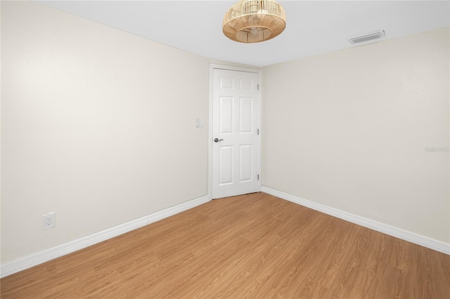 13148 3rd St E, Madeira Beach, FL 33708 - unfurnished room featuring light wood-style floors and baseboards