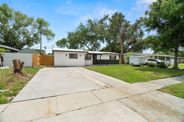 4414 W Oklahoma Ave, Tampa, FL 33616 - single story home featuring driveway and a gate