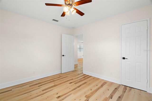 4414 W Oklahoma Ave, Tampa, FL 33616 - unfurnished bedroom featuring light wood-style floors and ceiling fan