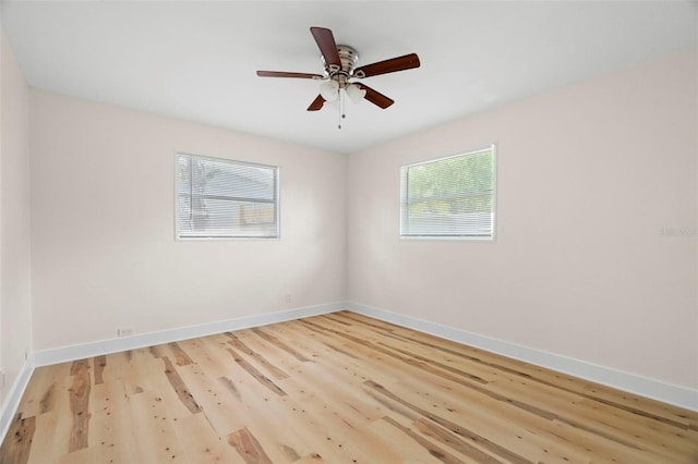 4414 W Oklahoma Ave, Tampa, FL 33616 - empty room featuring wood finished floors and ceiling fan