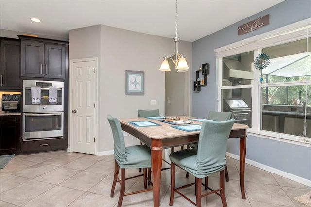 26972 Evergreen Chase Dr, Wesley Chapel, FL 33544 - dining room featuring light tile patterned floors and recessed lighting
