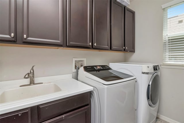 26972 Evergreen Chase Dr, Wesley Chapel, FL 33544 - laundry area with cabinet space and washing machine and clothes dryer