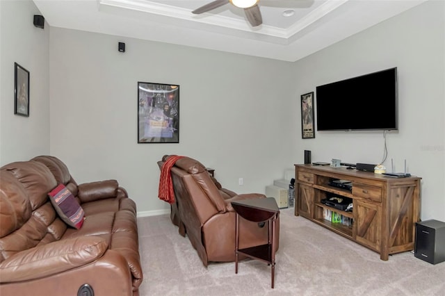 26972 Evergreen Chase Dr, Wesley Chapel, FL 33544 - living area featuring light carpet, a ceiling fan, a tray ceiling, and crown molding