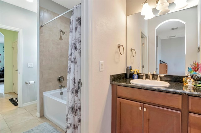 26972 Evergreen Chase Dr, Wesley Chapel, FL 33544 - bathroom with tile patterned flooring, vanity, and shower / bath combo with shower curtain