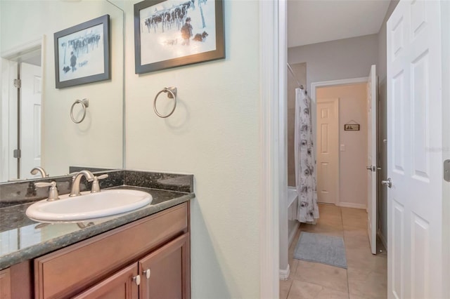 26972 Evergreen Chase Dr, Wesley Chapel, FL 33544 - full bath with tile patterned floors, vanity, and shower / bath combo with shower curtain