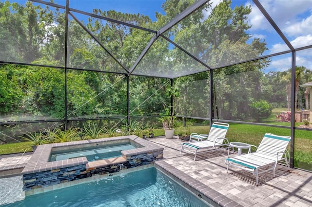 26972 Evergreen Chase Dr, Wesley Chapel, FL 33544 - view of swimming pool with a patio, glass enclosure, and a pool with connected hot tub