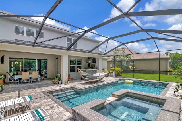 26972 Evergreen Chase Dr, Wesley Chapel, FL 33544 - view of pool featuring a patio, a pool with connected hot tub, outdoor dining area, and a lanai
