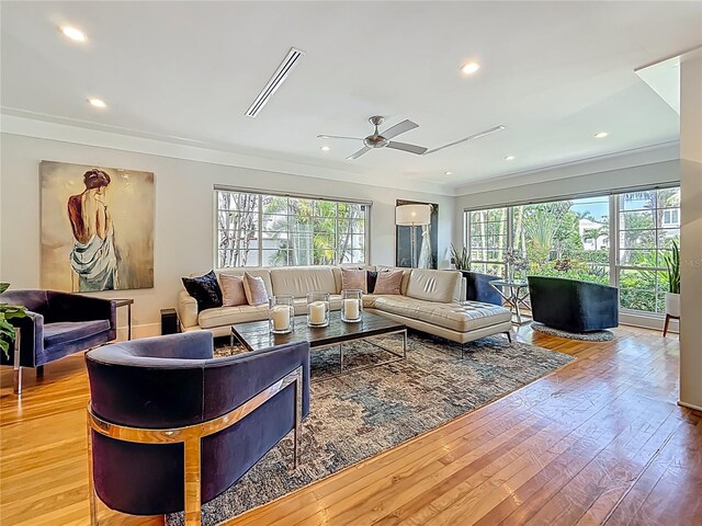 301 23rd Ave NE, Saint Petersburg, FL 33704 - living room featuring crown molding, a ceiling fan, wood finished floors, and recessed lighting