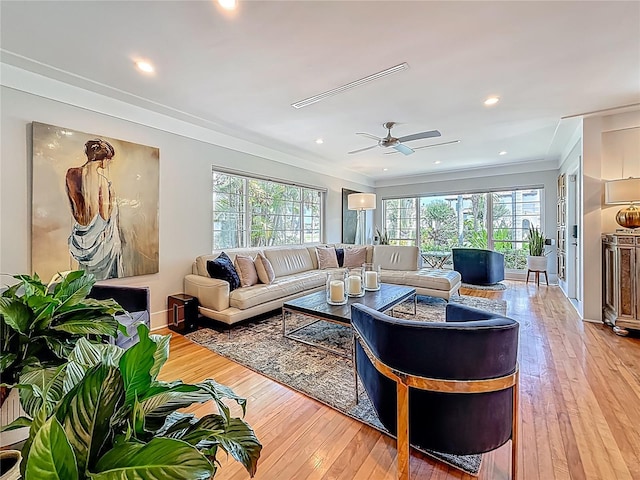 301 23rd Ave NE, Saint Petersburg, FL 33704 - living room featuring crown molding, a ceiling fan, light wood-style flooring, and recessed lighting