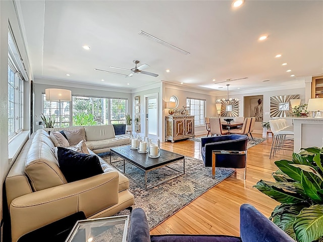 301 23rd Ave NE, Saint Petersburg, FL 33704 - living room with ornamental molding, ceiling fan, light wood-type flooring, and recessed lighting